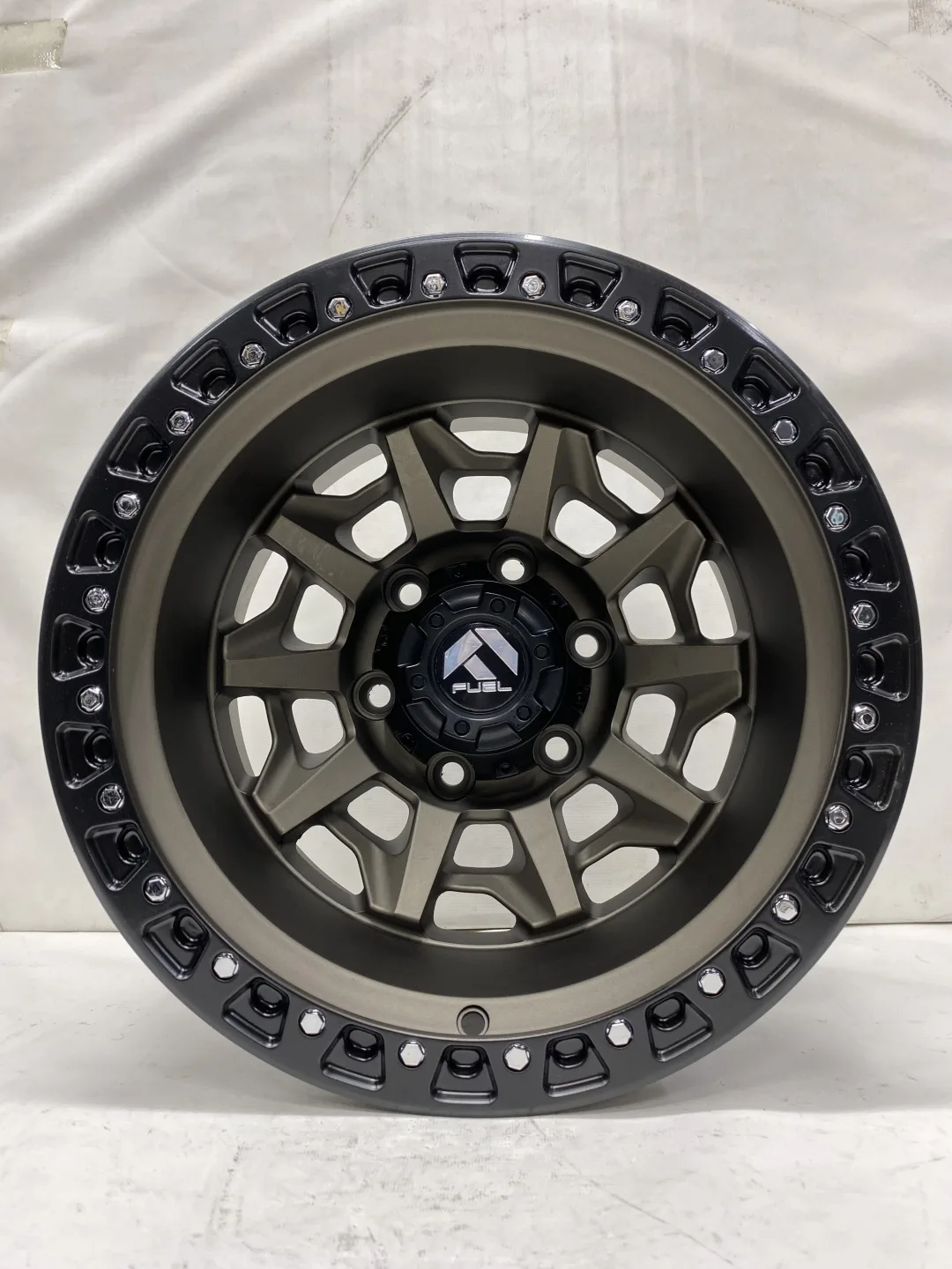 RNO QC1261 10x15/6x139.7 D110 ET-44 4 диска черный, бронзовый